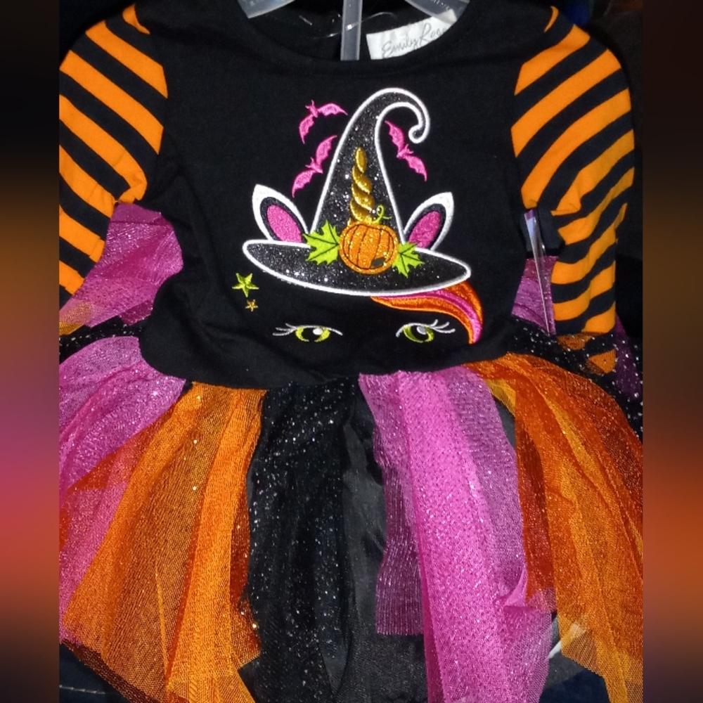 Halloween outfit for a baby girl.